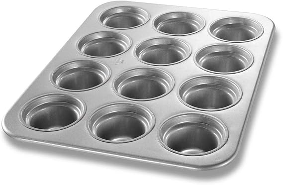 Chicago Metallic Glazed Aluminum Large-Crown 12 Cup Muffin Pan | 13-1/2" x 17-7/8" overall, makes (12) 3-1/2" dia. muffins, 7.3 oz. capacity each, wire in rim, hand wash recommended