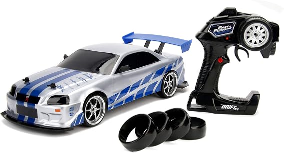 Jada Toys Fast & Furious RC Nissan Skyline GTR, R34, Drift Function, RC Car, Remote Controlled Car with Radio Remote Control, 4 Spare Tyres, USB Charging Function, 1:10 Scale, Blue/Silver