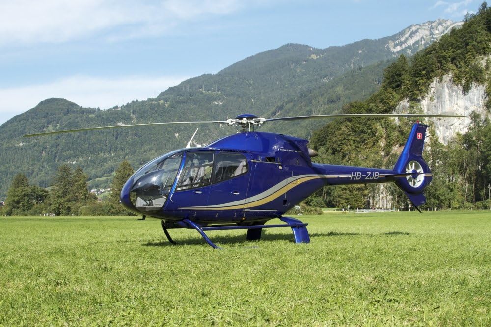 Eurocopter EC130 light utility helicopter Mollis Air Base Switzerland Poster Print 17 x 11