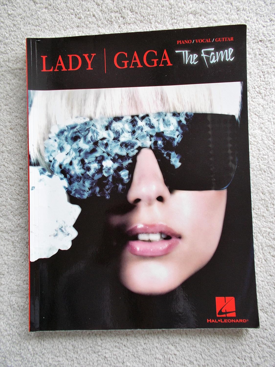Lady Gaga: The Fame Paper Cover – July 1, 2009